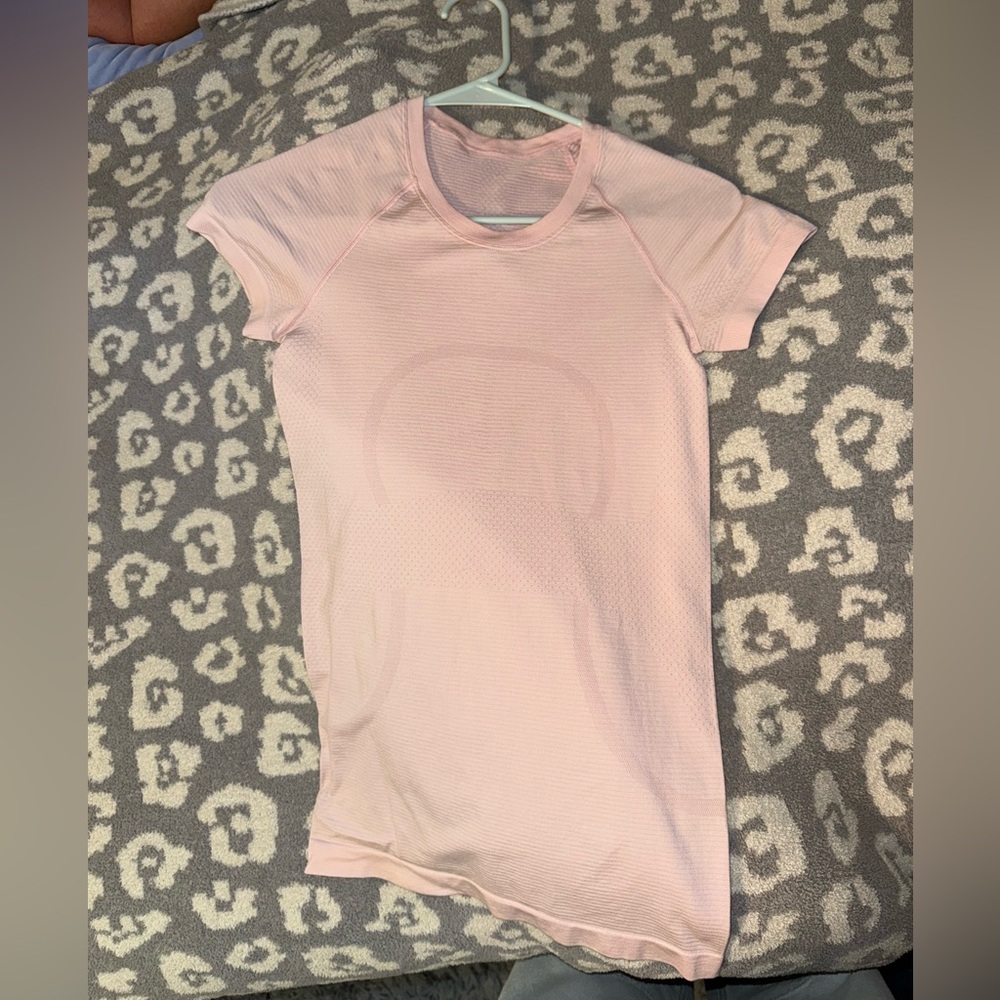 Never worn Lululemon Swiftly Tech Short Sleeve Shirt Hip Length